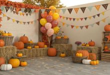 Pumpkin patch birthday party setup with hay bales, pumpkins, and festive fall decorations for kids (1)