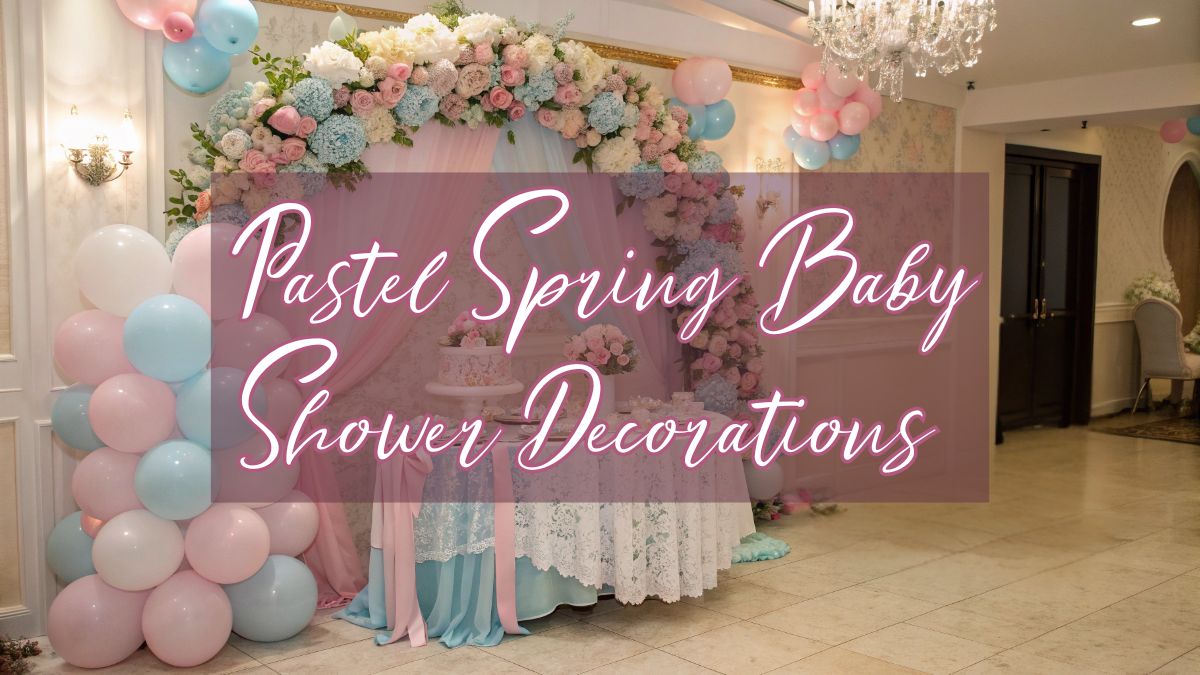 Pastel spring baby shower decorations with floral backdrop, balloon arch, and elegant baby shower table setup